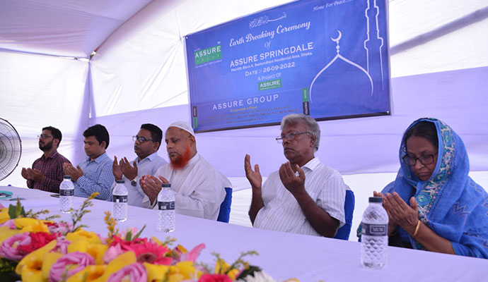 Praying on Ground Breaking Ceremony of Assure Springdale
